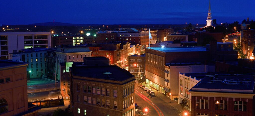 Night view of downtown Bangor, Maine—home to businesses powered by managed IT solutions that keep operations secure, connected, and efficient.
