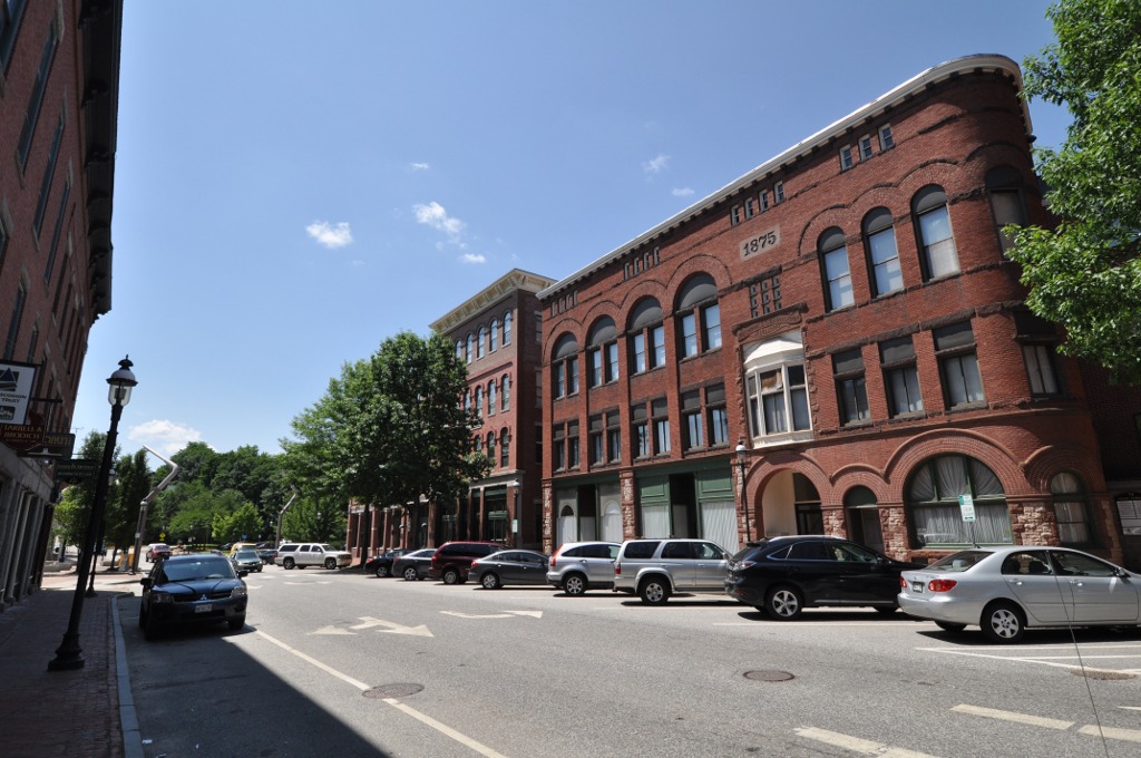 Historic downtown Auburn, Maine, featuring 19th-century brick architecture and local businesses, reflecting the city’s blend of tradition and modern managed IT support.