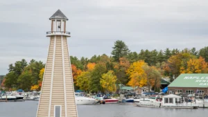 A scenic view of downtown Bridgton, Maine, showcasing local architecture and fall foliage, representing the kind of tight-knit community that benefits from reliable managed IT services.
