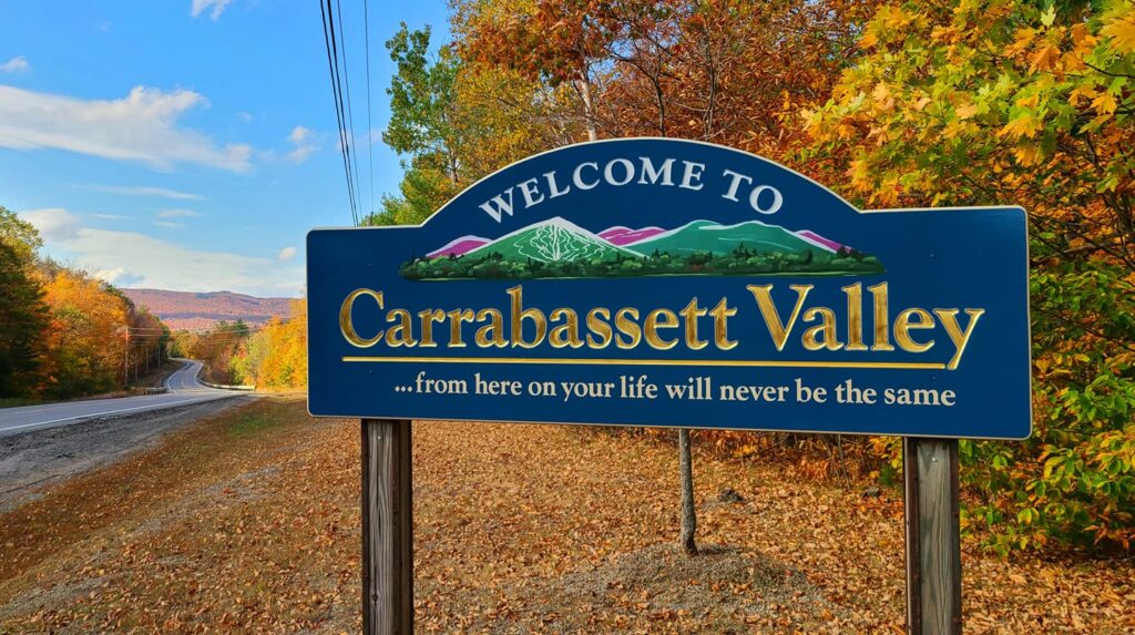 Welcome sign at the entrance to Carrabassett Valley, Maine, representing a resilient mountain town embracing managed IT for local growth and connectivity.