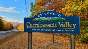 Welcome sign at the entrance to Carrabassett Valley, Maine, representing a resilient mountain town embracing managed IT for local growth and connectivity.