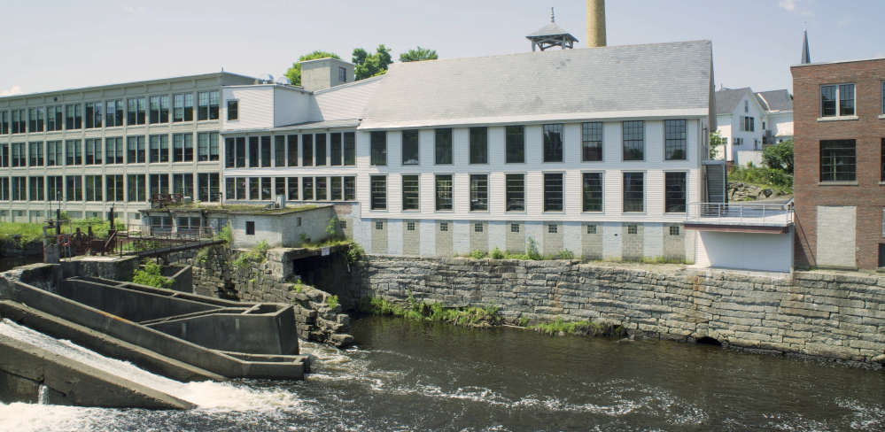 Historic mill buildings in Dover-Foxcroft, Maine, where managed IT services support local businesses and community operations with dependable technology.