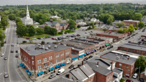 Aerial view of downtown Ellsworth, Maine, where local businesses and city infrastructure increasingly rely on managed IT services to stay connected and secure.
