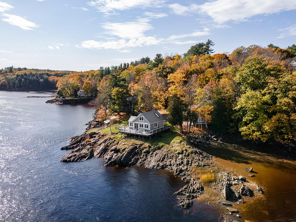 Managed IT support in Hampden, Maine—scenic riverfront with fall foliage reflects the town’s balance of natural beauty and reliable tech infrastructure
