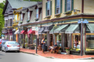 Colorful storefronts along Main Street in Newport, Maine, reflect the town’s blend of charm and modern progress, where managed IT services quietly support thriving small businesses behind the scenes.