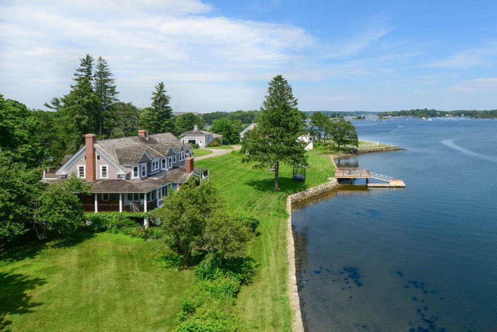 Waterfront homes and trees in North Berwick, Maine, representing a community supported by managed IT services for modern connectivity and local business reliability.