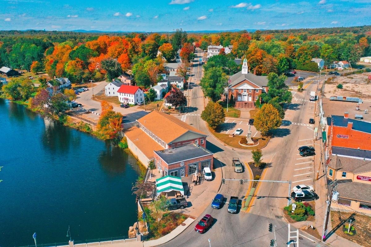Aerial view of a colorful downtown North Berwick, Maine in fall, symbolizing a vibrant community supported by managed IT solutions for local businesses.