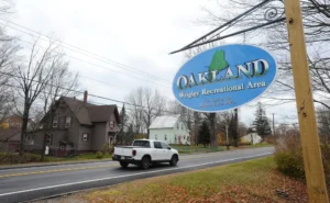 Welcome sign at the entrance to Oakland, Maine, representing a growing community embracing managed IT solutions for secure, reliable technology infrastructure.