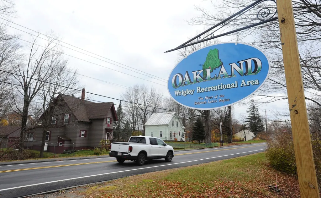 Welcome sign at the entrance to Oakland, Maine, representing a growing community embracing managed IT solutions for secure, reliable technology infrastructure.