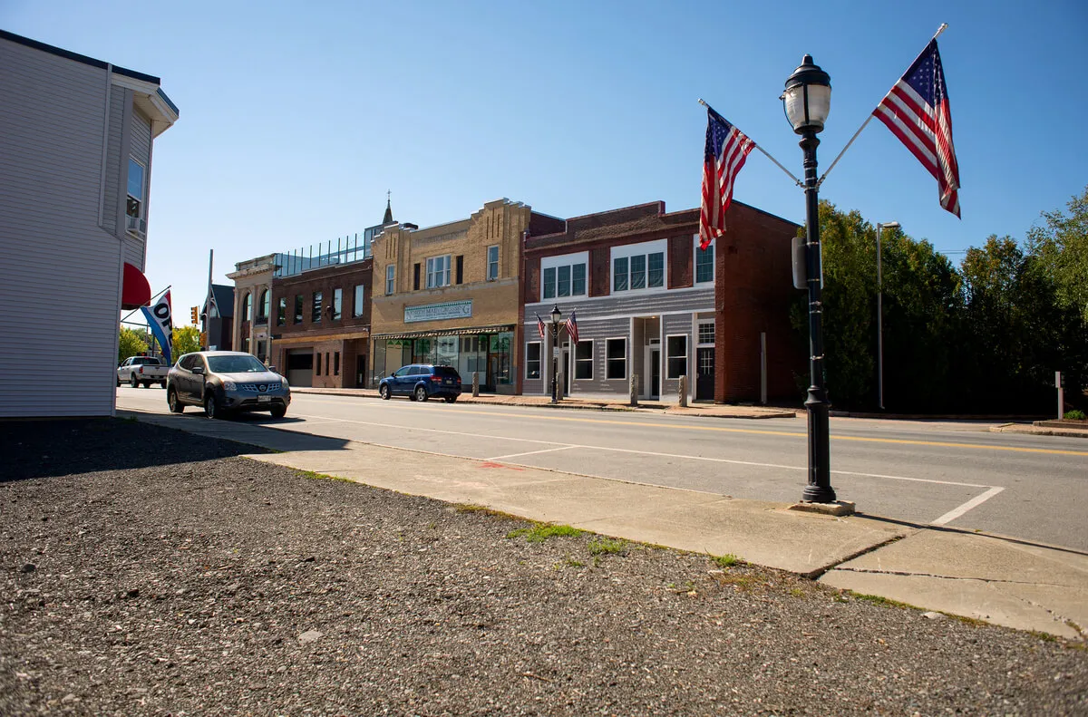 Downtown Old Town, Maine on a sunny day, where reliable managed IT supports thriving small businesses.