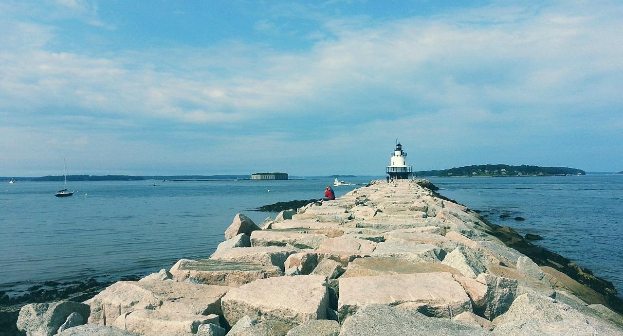 Breakwater lighthouse guiding the way in South Portland, representing the steady support and reliability of local managed IT services.