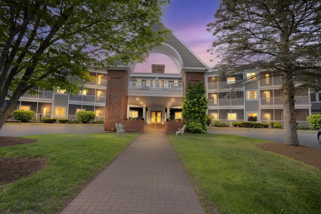 Evening view of a modern building in Topsham, Maine, representing the growing role of managed IT in community infrastructure.